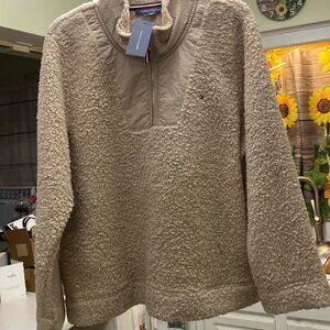 A beige Tommy Hilfiger pullover Sherpa shirt